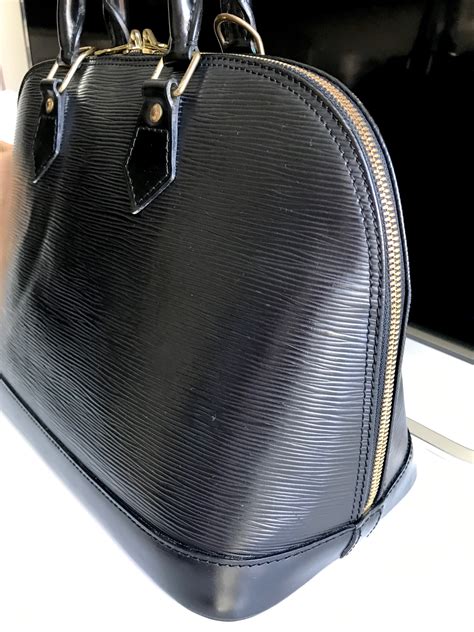 louis vuitton black epi backpack|louis vuitton alma backpack.